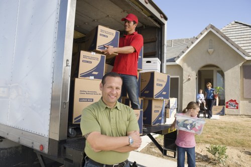 Packed boxes and furniture loaded for truck hire