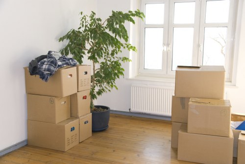 Furniture being moved carefully by a Charlton man with van service