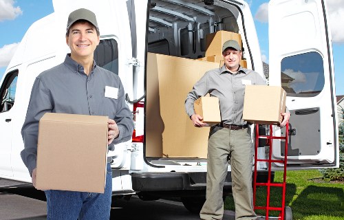 Labelled office boxes and packed IT equipment for safe transport