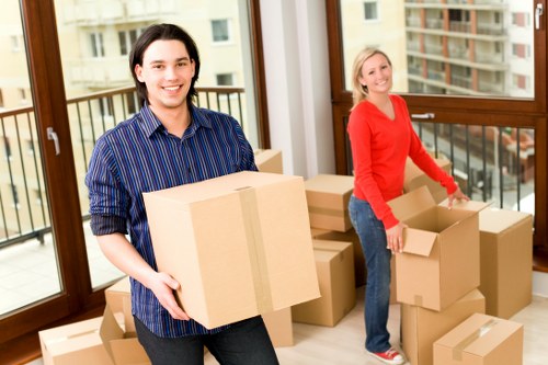 Packed boxes and furniture ready for house removals in Charlton