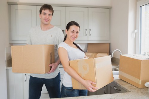 Packing and loading household furniture into a removals van
